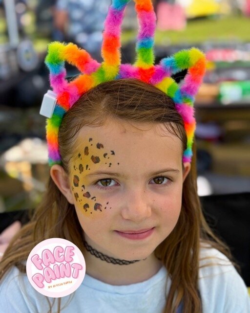 face-painting-by-alyssa-daken-Bemidji-cute-gold-cheetah-leopard-print-face-paint-design
