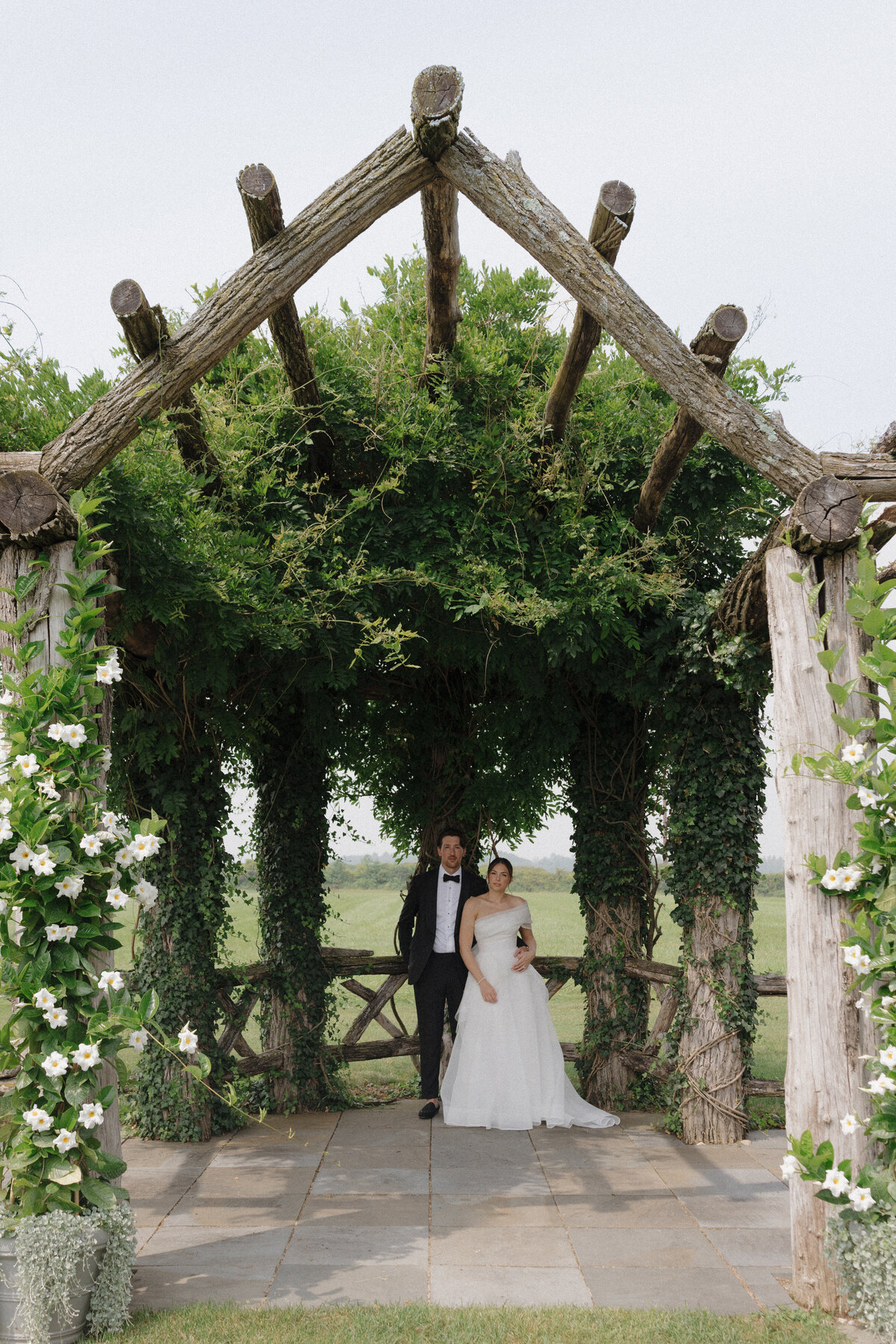 Stunning editorial bridal portrait demonstrating luxury wedding photography at Connecticut destination venue. Lauren Alatriste's fashion forward approach captures authentic emotion with sophisticated composition, creating magazine-worthy imagery that celebrates both artistry and love.