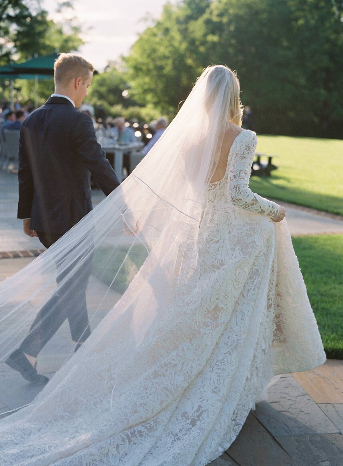 036-elegant-couple-walking-through-beautiful-light-fairmont-country-club-virginia-0001