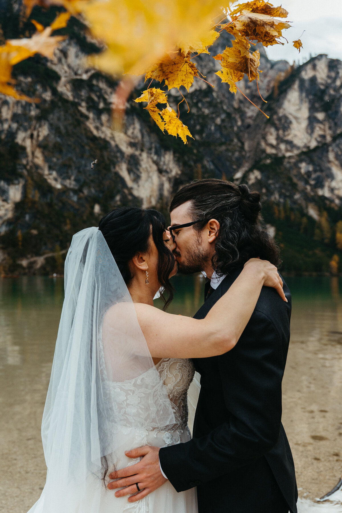 Couple kissing during intimate elopement in South Tyrol
