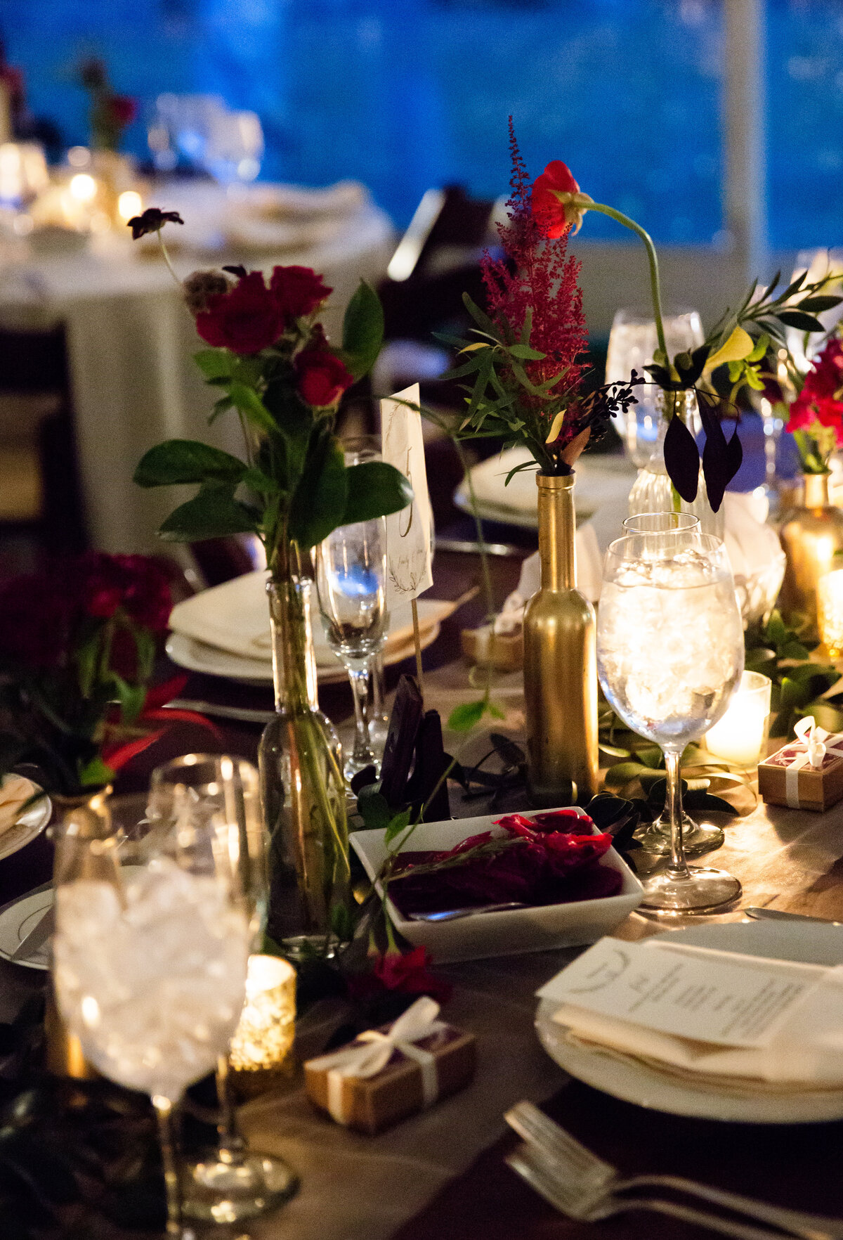 Antique gold and moody wedding reception tabletop