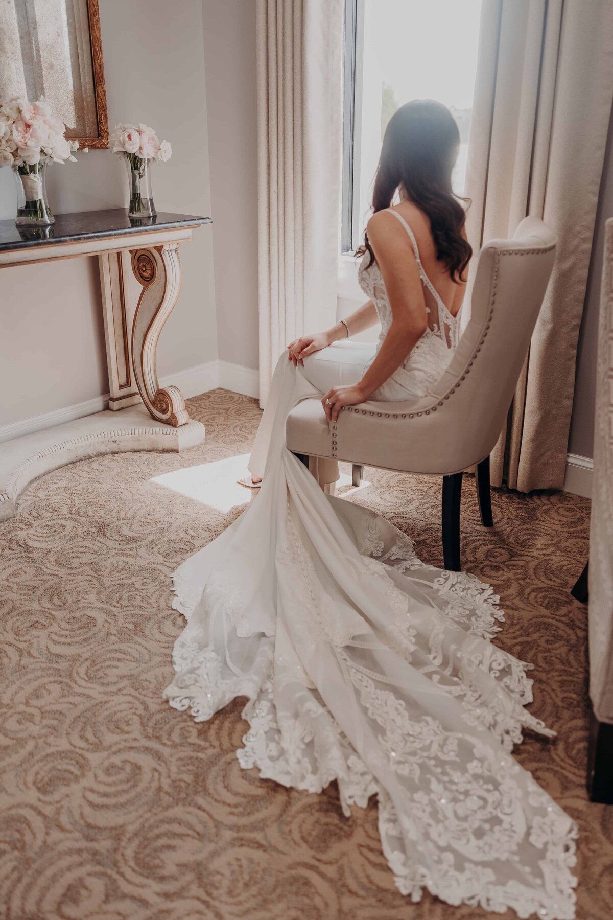 Bride getting ready at Lakewood Ranch Country Club in Sarasota, Florida — wedding photography by Angela Moon.