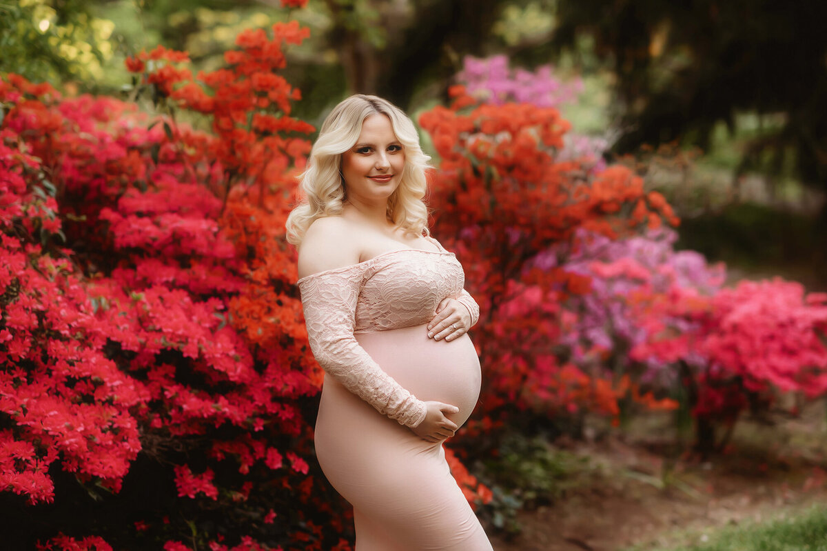 Expectant mother poses for Maternity Photoshoot at Biltmore Estate in Asheville, NC.