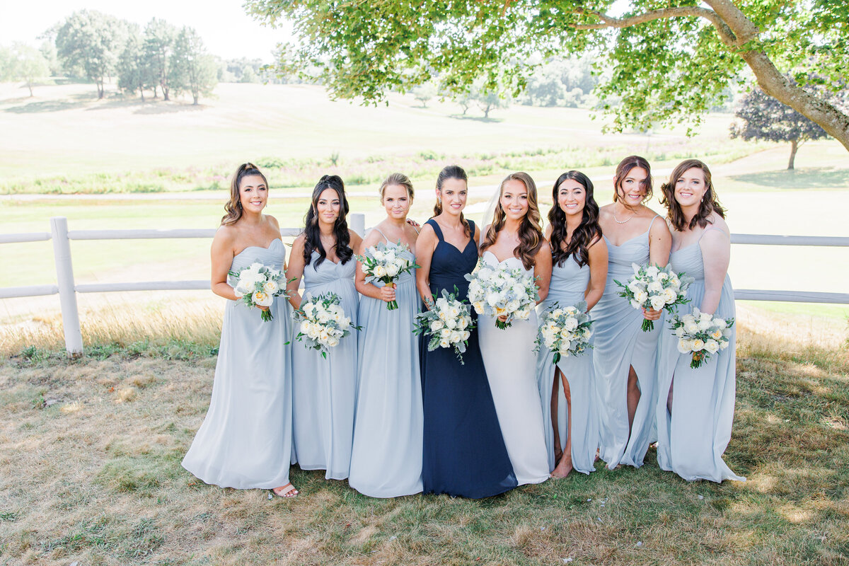 Bridal party smiling at the camera during a South Shore Country Club wedding
