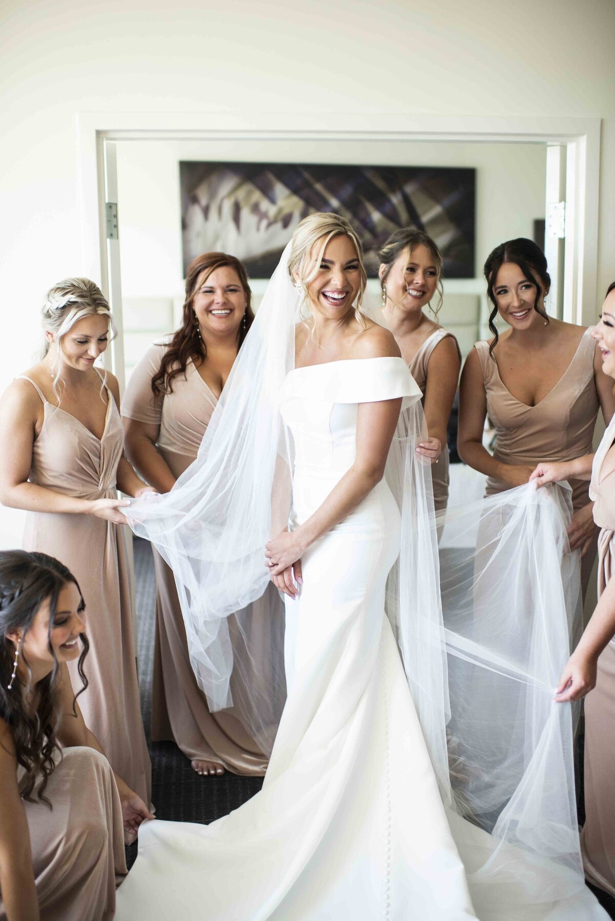 Bride getting ready with the bridesmaids