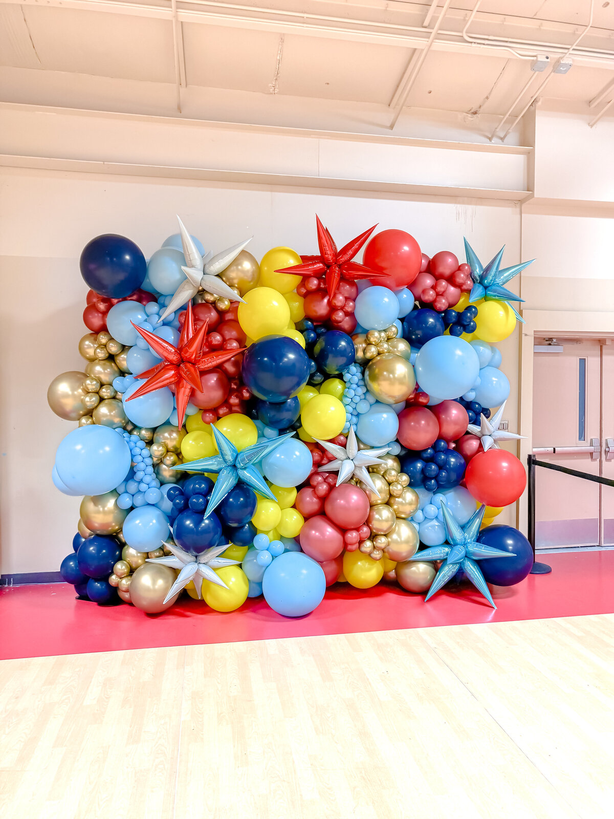 blue red yellow balloon wall