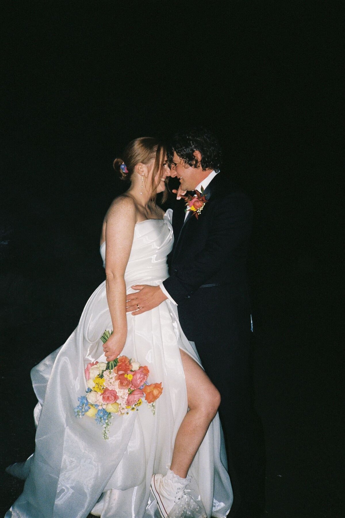 35mm film photo of bride and groom after shearing shed reception