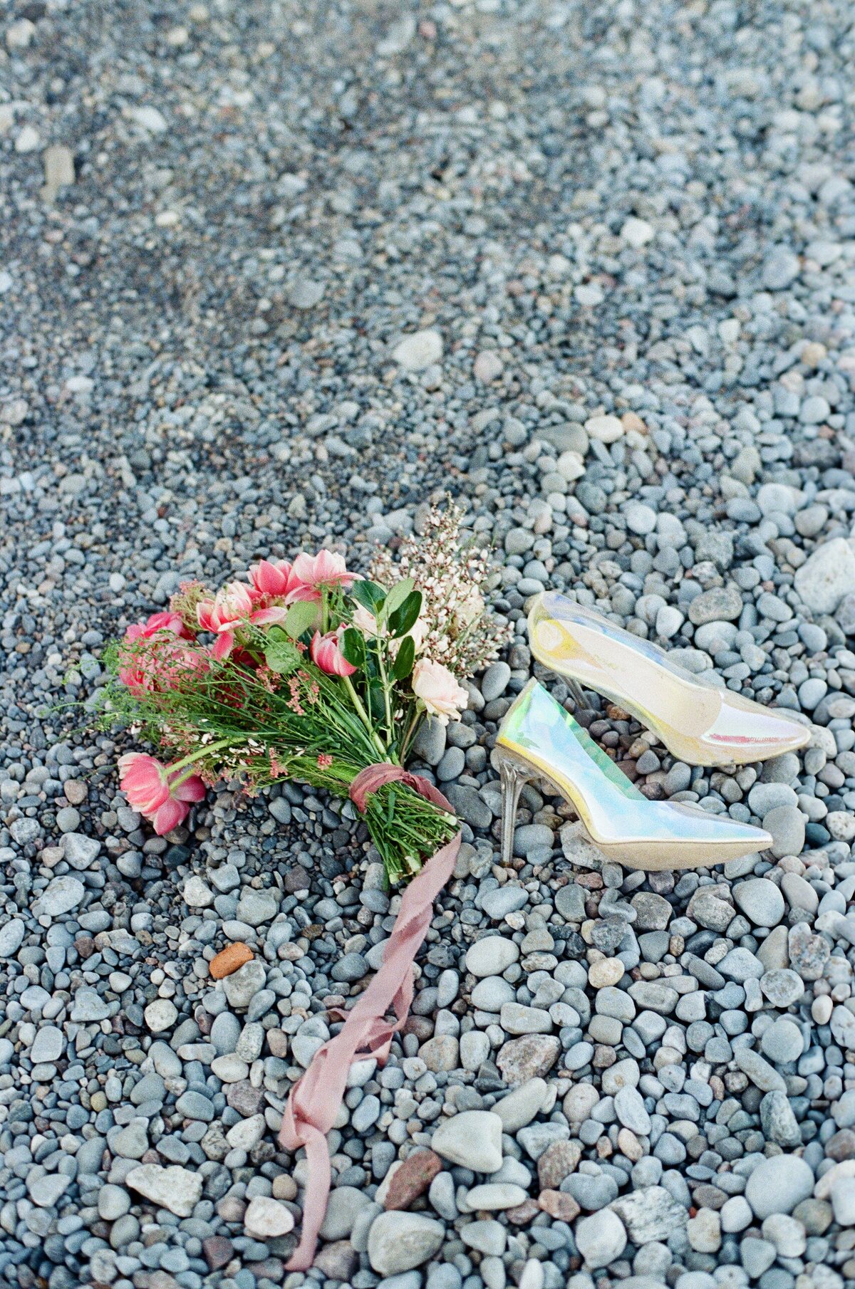 A wedding shoe displayed with a bouquet at a Toronto wedding