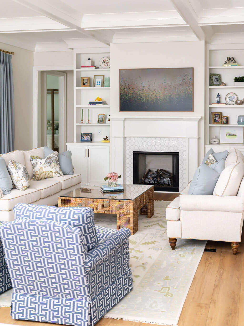 sweet southern home gracies space white couches and wooden coffee table in living room with fireplace