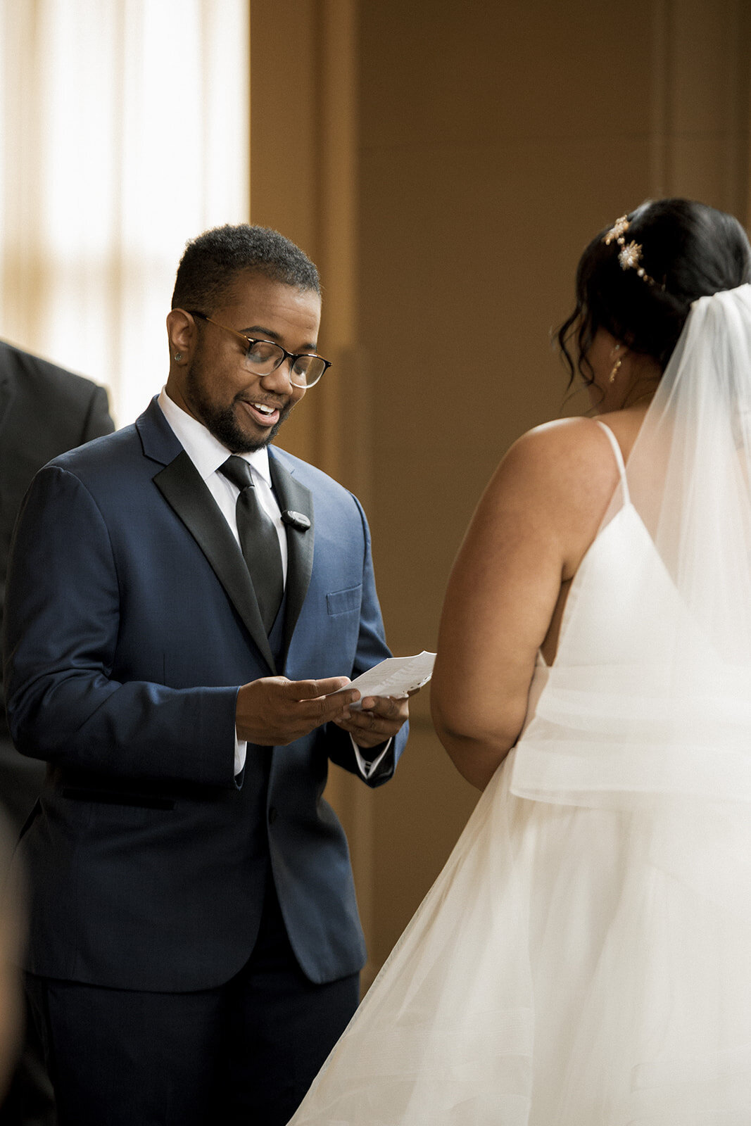 couple reading vows wedding ceremony