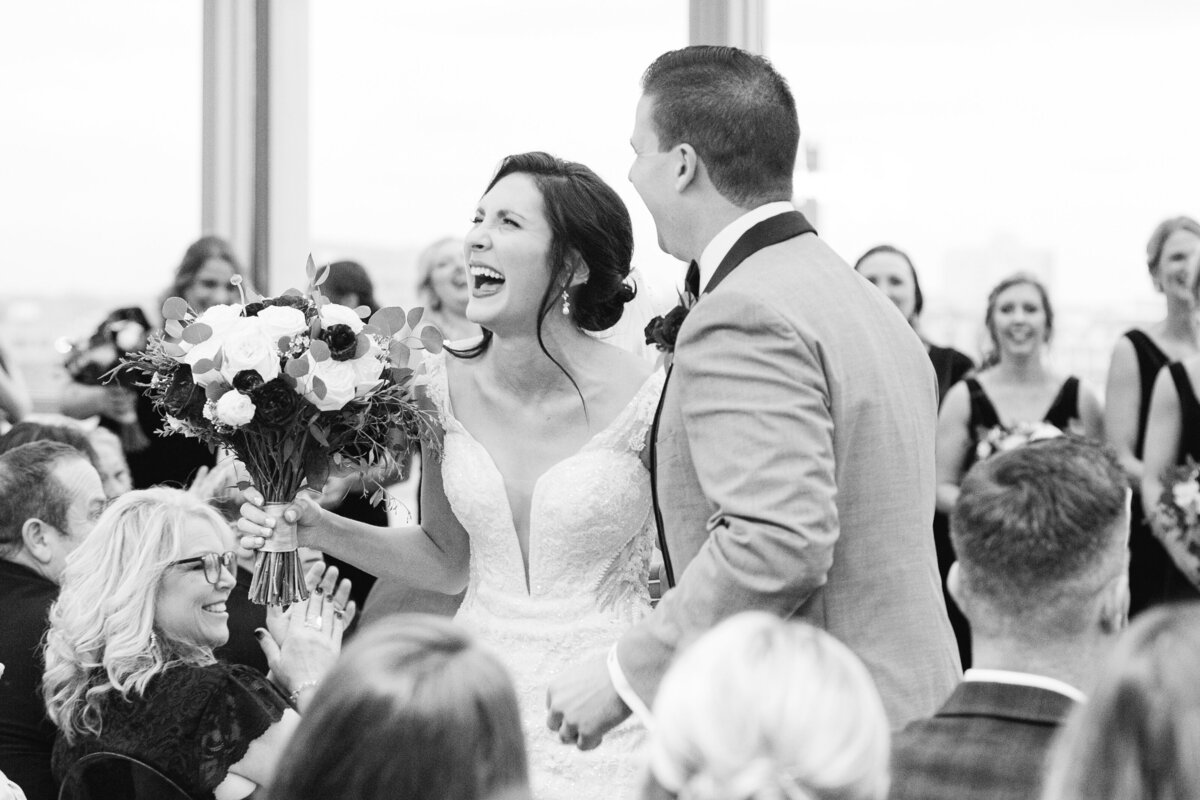 couple walking down the aisle after they are married at the revery in columbus ohio