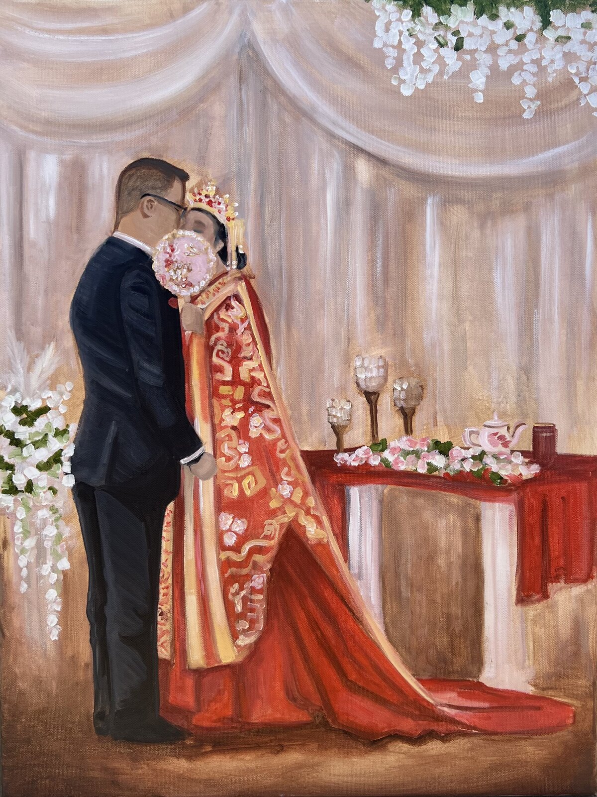 In a traditional chinese tea ceremony a bride and groom  modestly share a kiss in a live wedding painting portrayed by Olivia Andruss Artistry. in