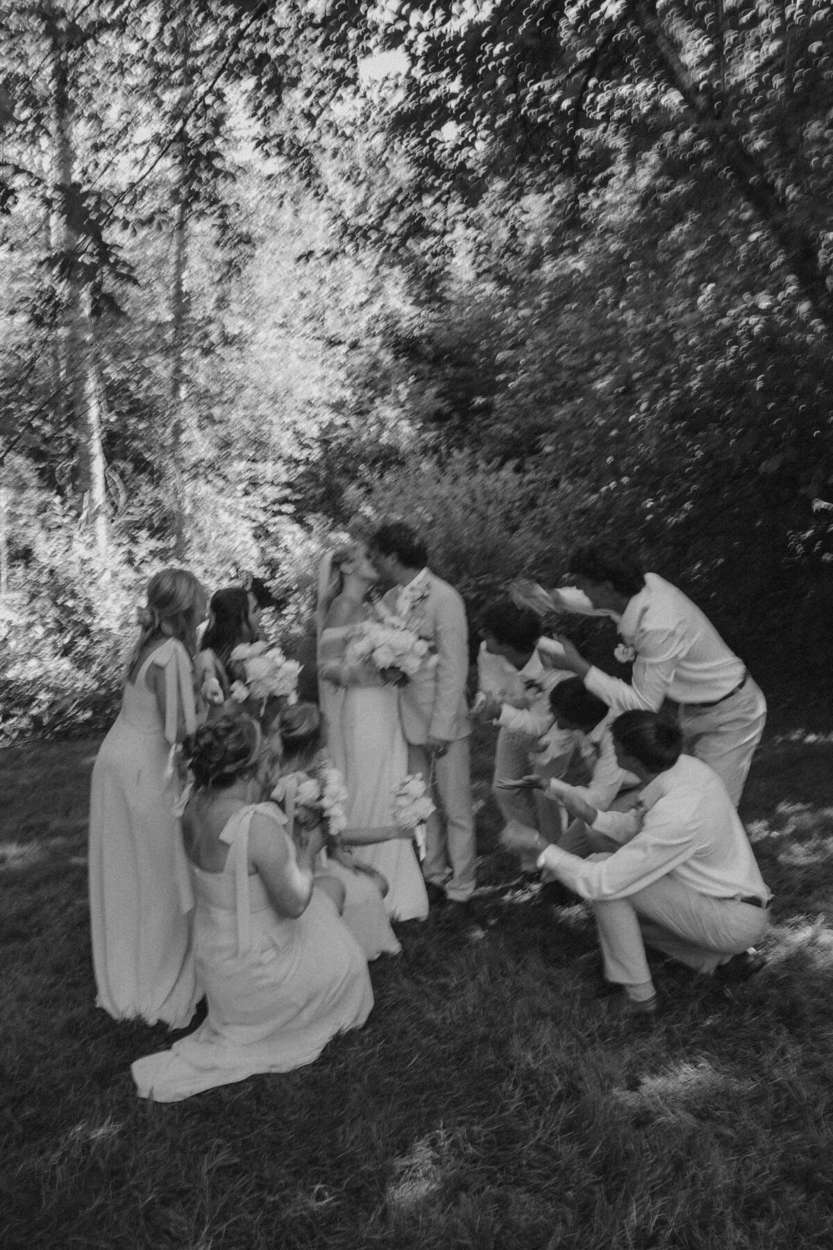 Playful Wedding Party Celebrating Newlyweds | Candid Oregon Wedding Photographer