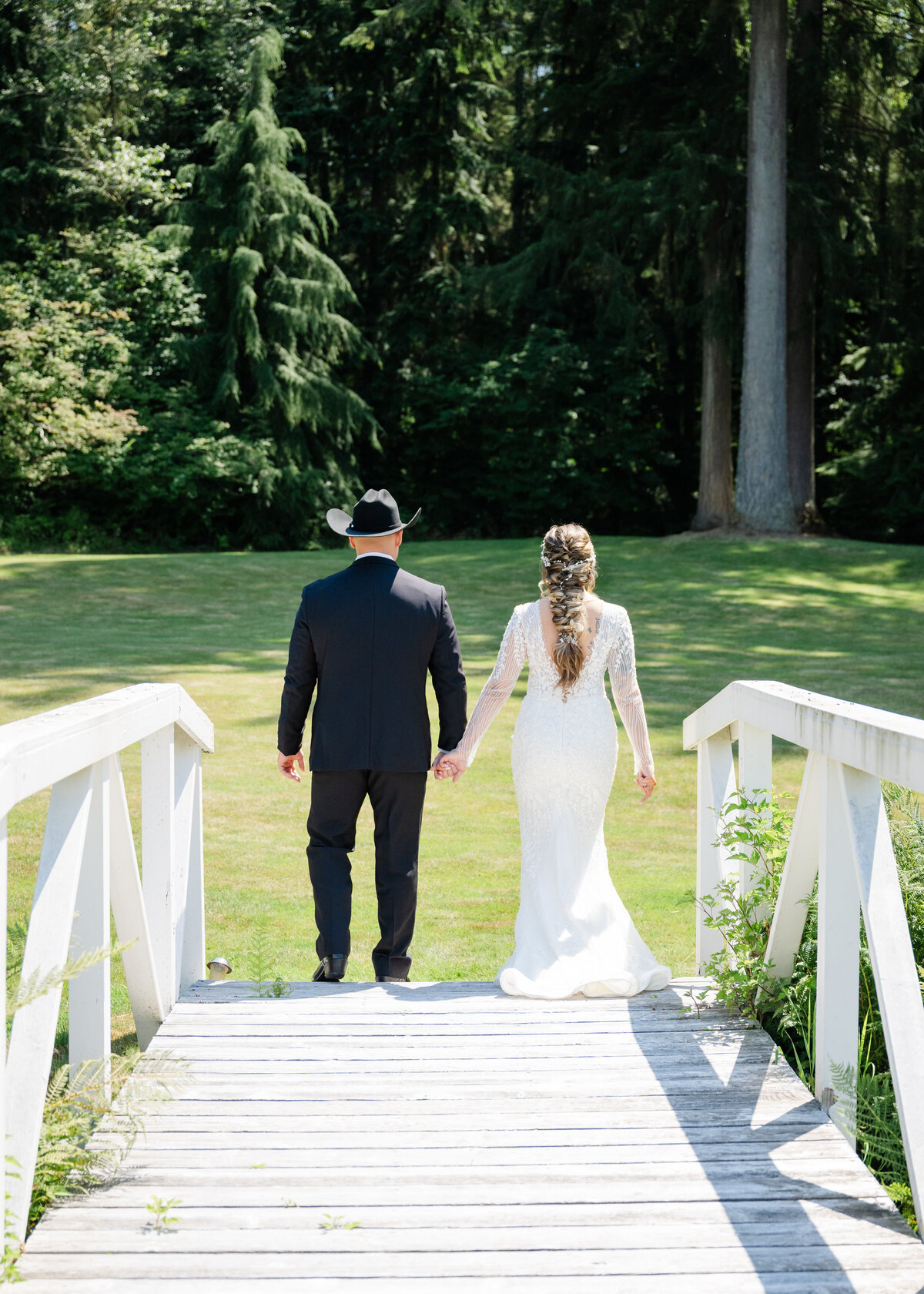 wedding first look on white bridge at the natures connection snohomish
