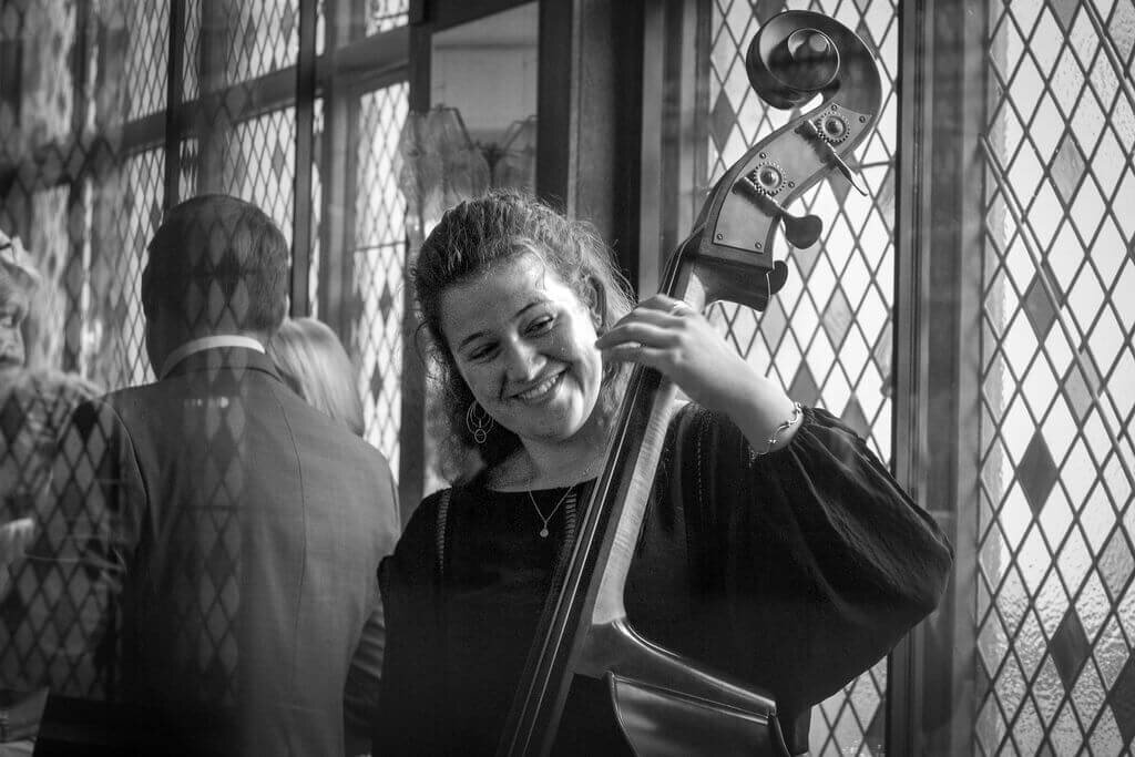 Woman playing Cello at The Ivy Soho wedding reception