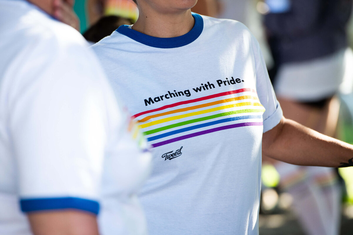 Ottawa event photos of a pride t-shirt with the slogan "Marching with Pride"   Captured by JEMMAN Photography COMMERCIAL during the Tweed Canopy Growth Pride Parade.