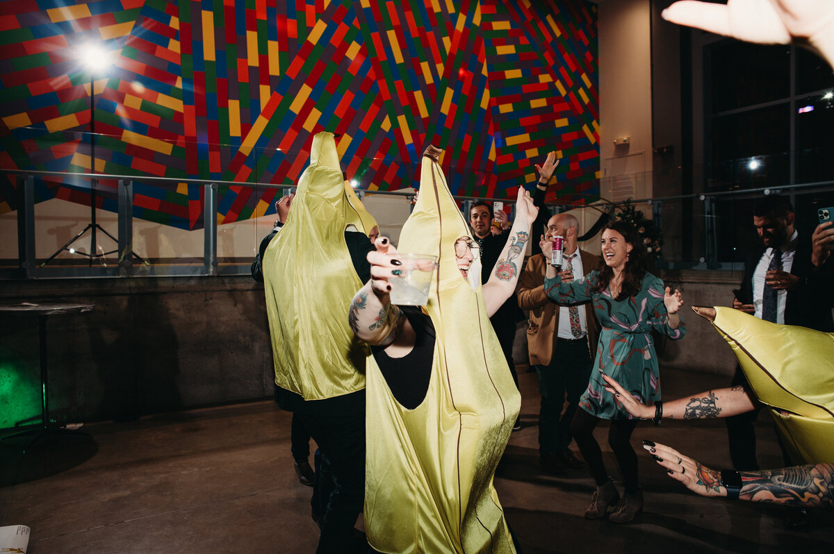 Guests  surprise newlyweds with banana costumes for the reception