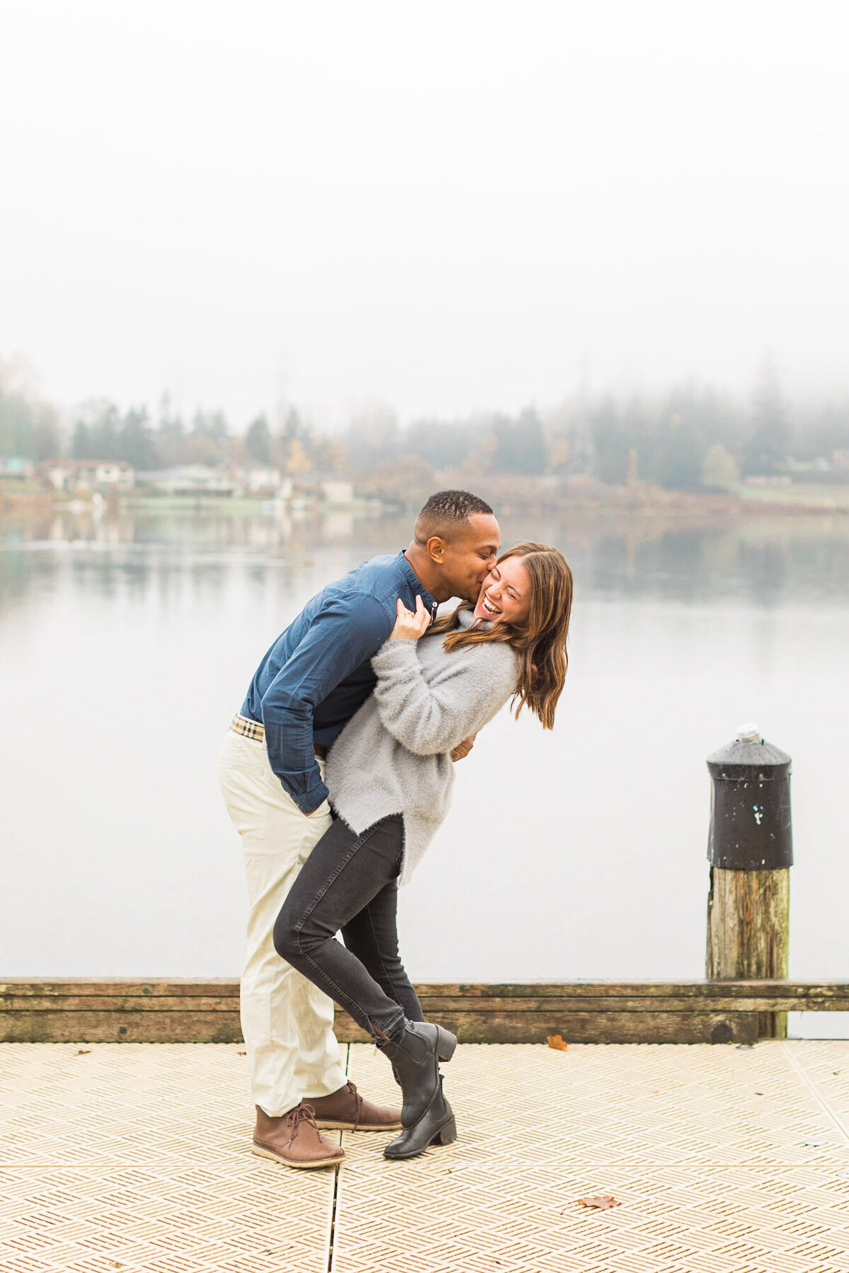 Joyful and fun engagement photos by misty lake in Snohomish WA near Woodinville colorful photograph by Joanna Monger Photography