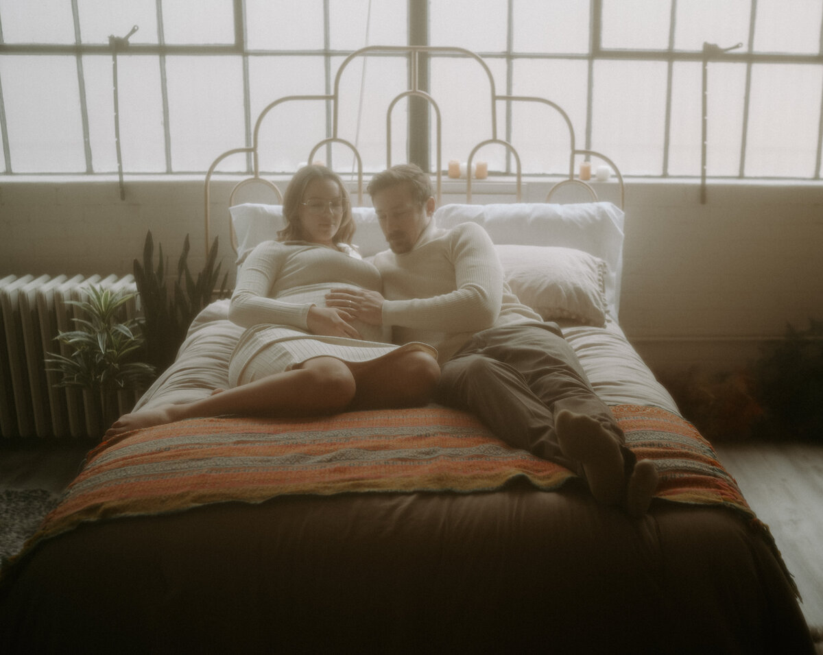 A moody, vintage-style engagement portrait in Spokane, Washington, blending fine art photography with nostalgic romance.