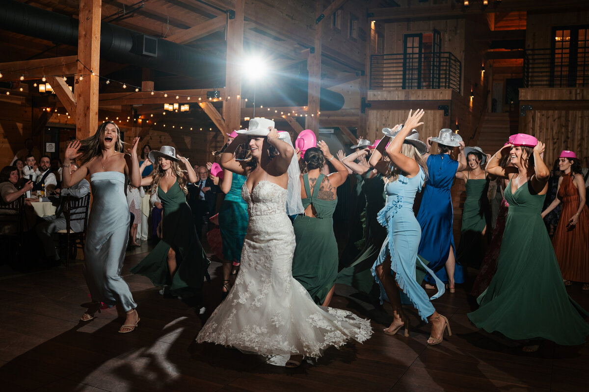 Reception decor featuring rustic charm and romantic candlelight