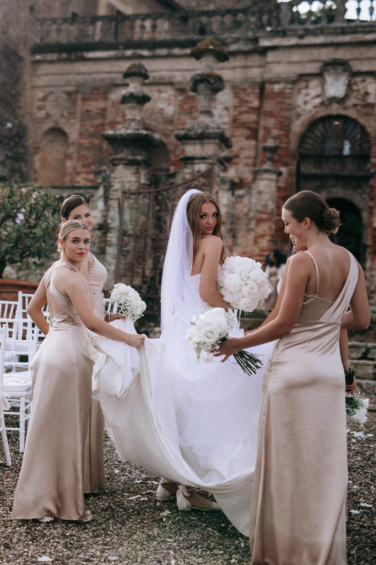 Bride with Bridesmaids in Castle wedding in Tuscany