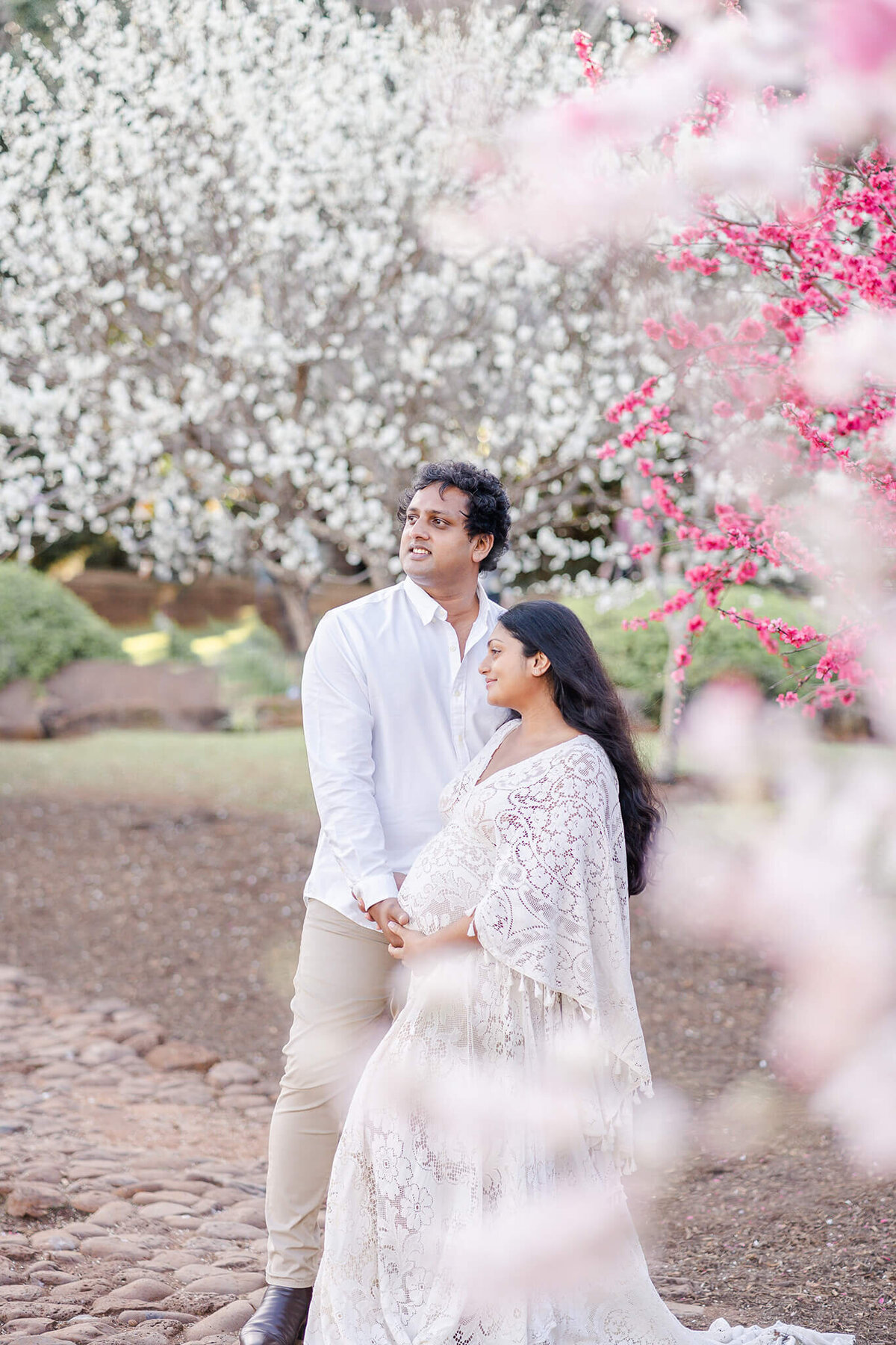 "Radiate in 'We Are Reclamation' beauty as a mum embraces the joy of pregnancy amidst Brisbane's Japanese garden's cherry blossoms