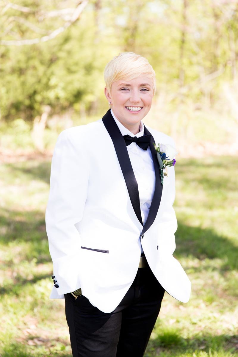 Woman wearing black and white tuxedo