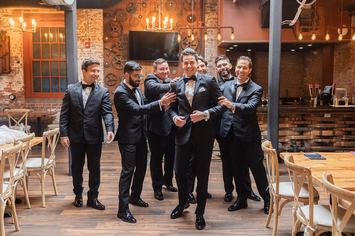 groom and groomsmen have fun before the ceremony at city winery