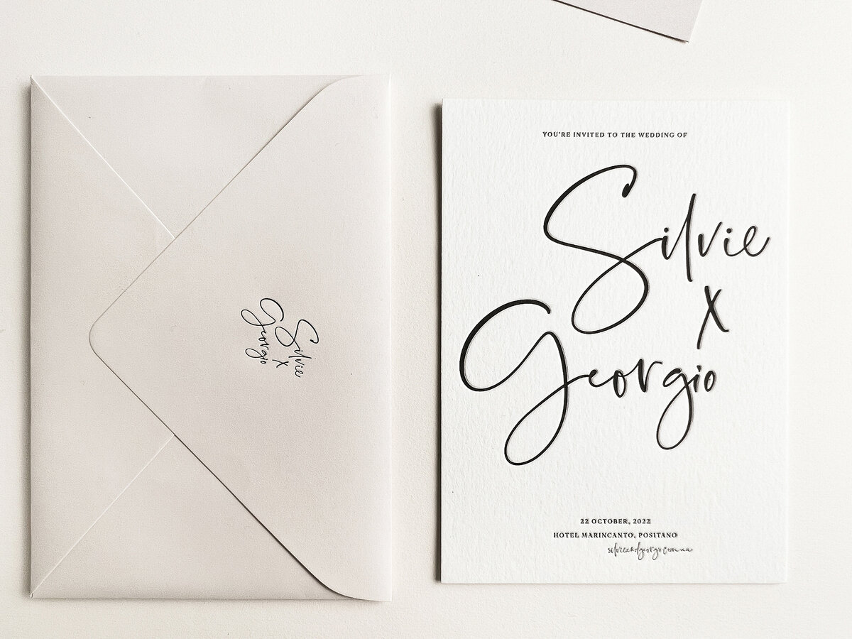 Sylvie oversized lettering letterpress wedding invitation and envelope