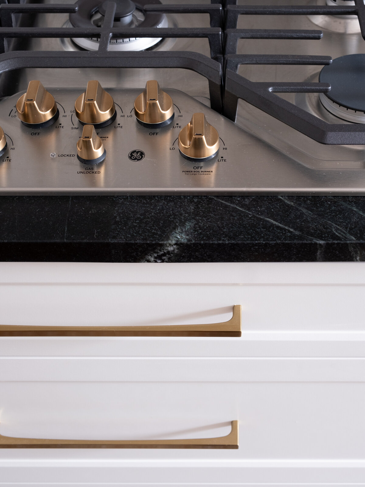 hello-home-austin-cream-kitchen-remodel-contemporary-kitchen-gas-cooktop-soapstone-countertop-21