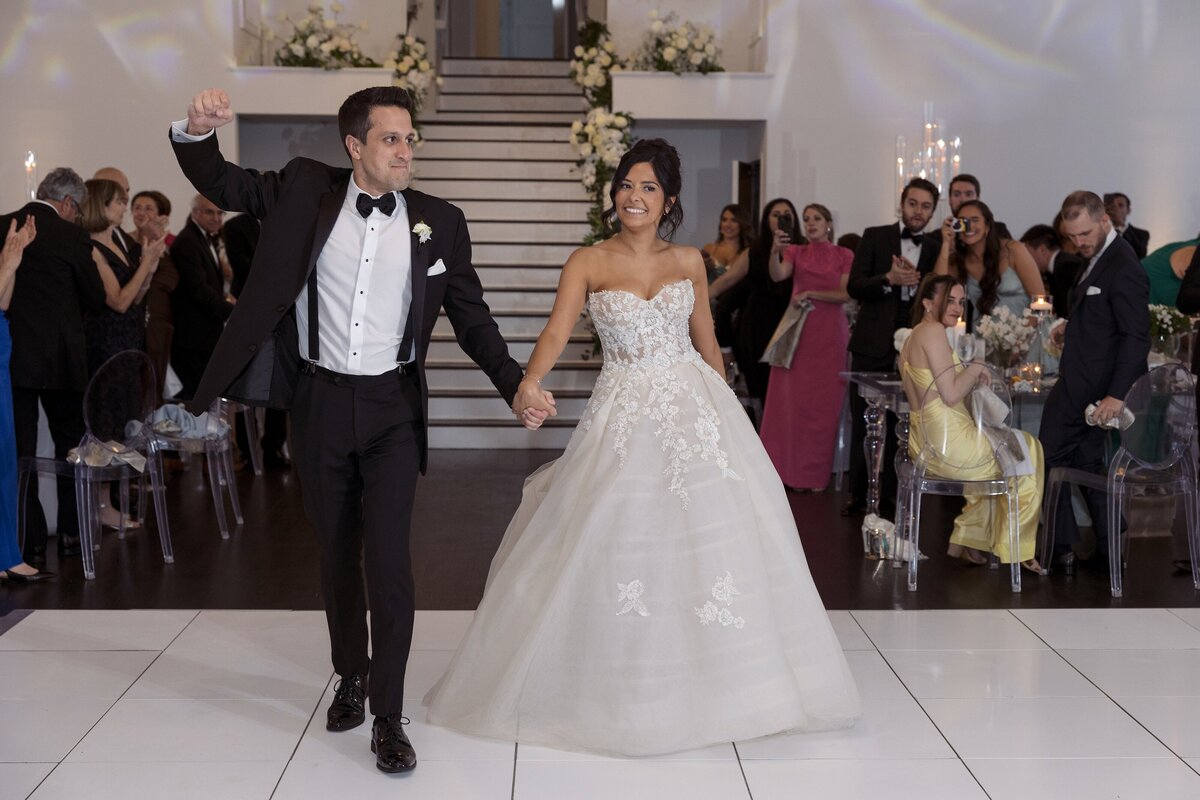 Bride and Groom enter the wedding reception at Belle Mer Newport