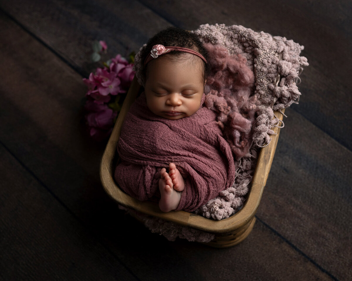 Newborn baby girl purple wrap floral headband Round Rock photographer