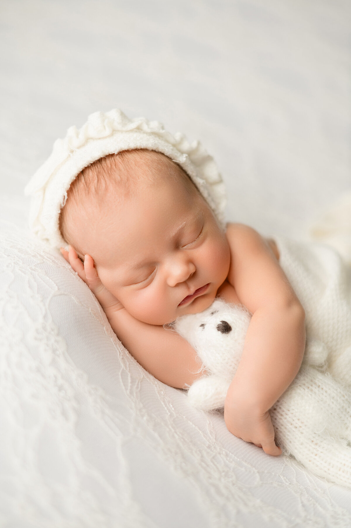 Tightly swaddled newborn baby portrait by Houston newborn photographer.