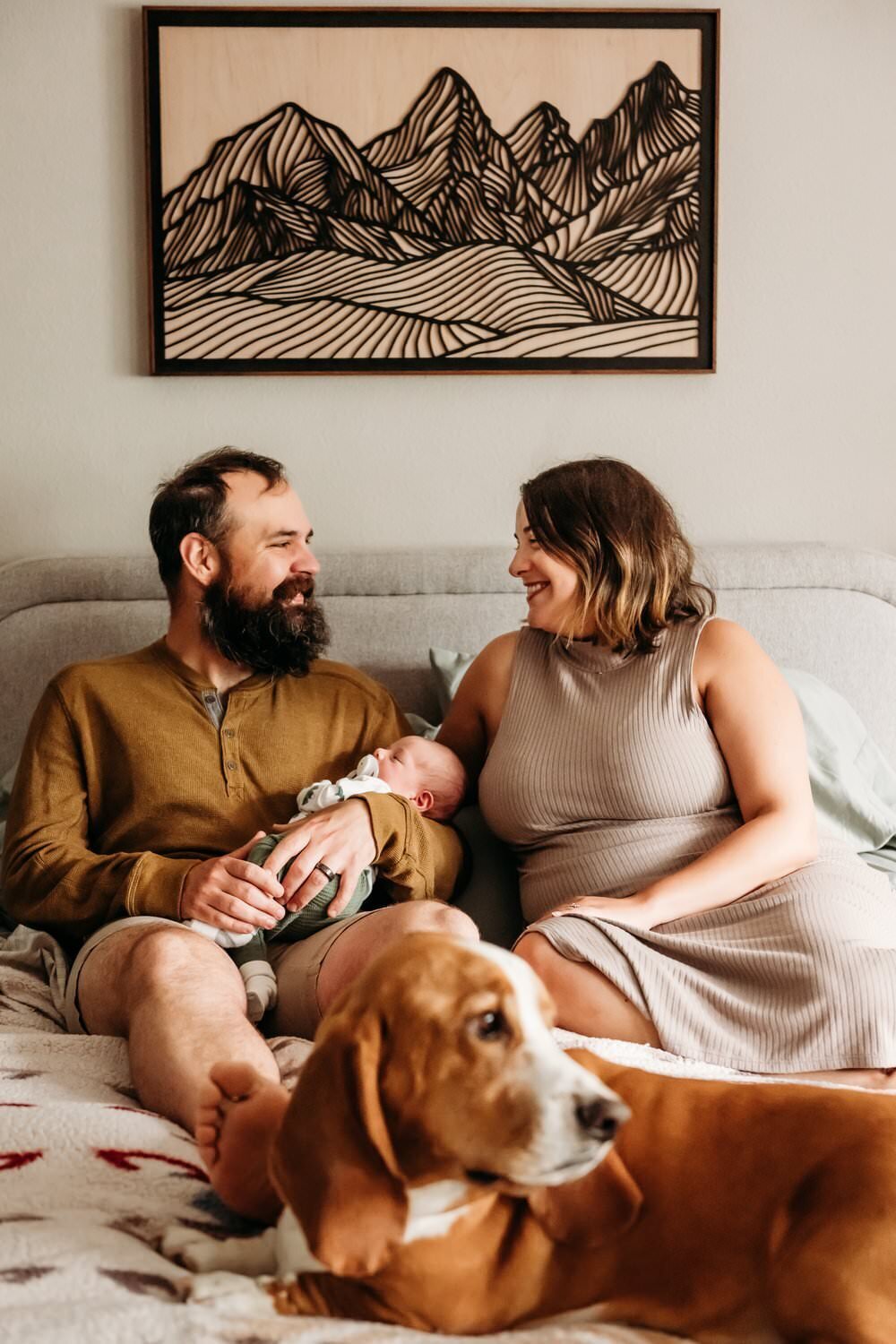 family-newborn-on-bed