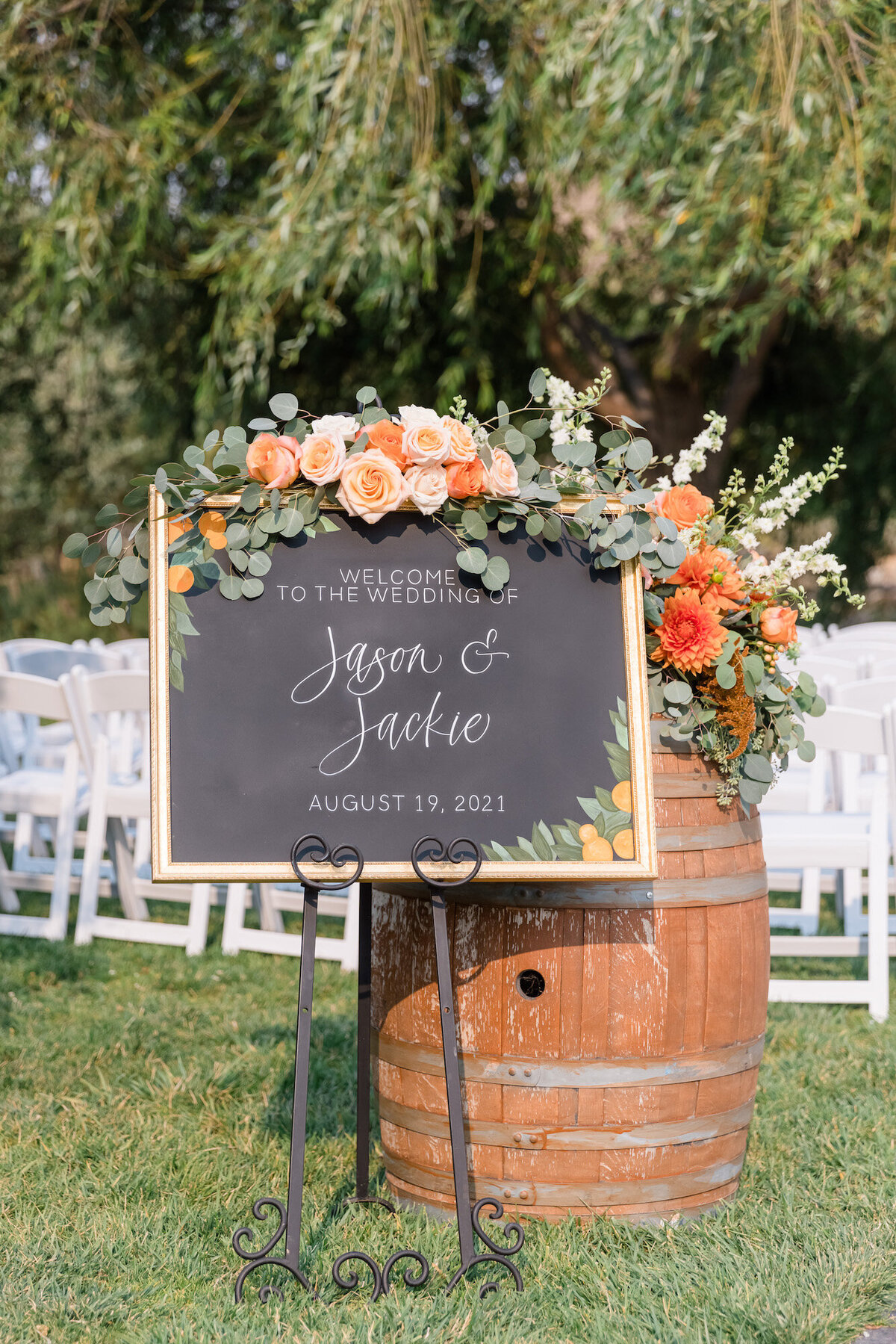 Black chalkboard with gold frame displaying a wedding welcome sign, for rent in the Bay Area