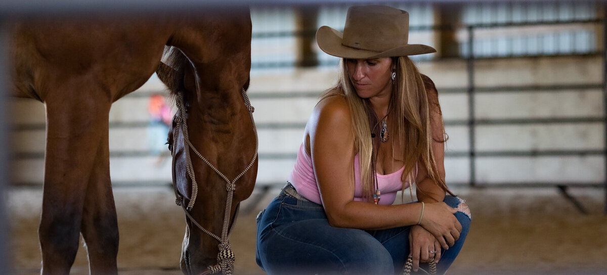 Konnie Fries teaching a wild mustang to listen