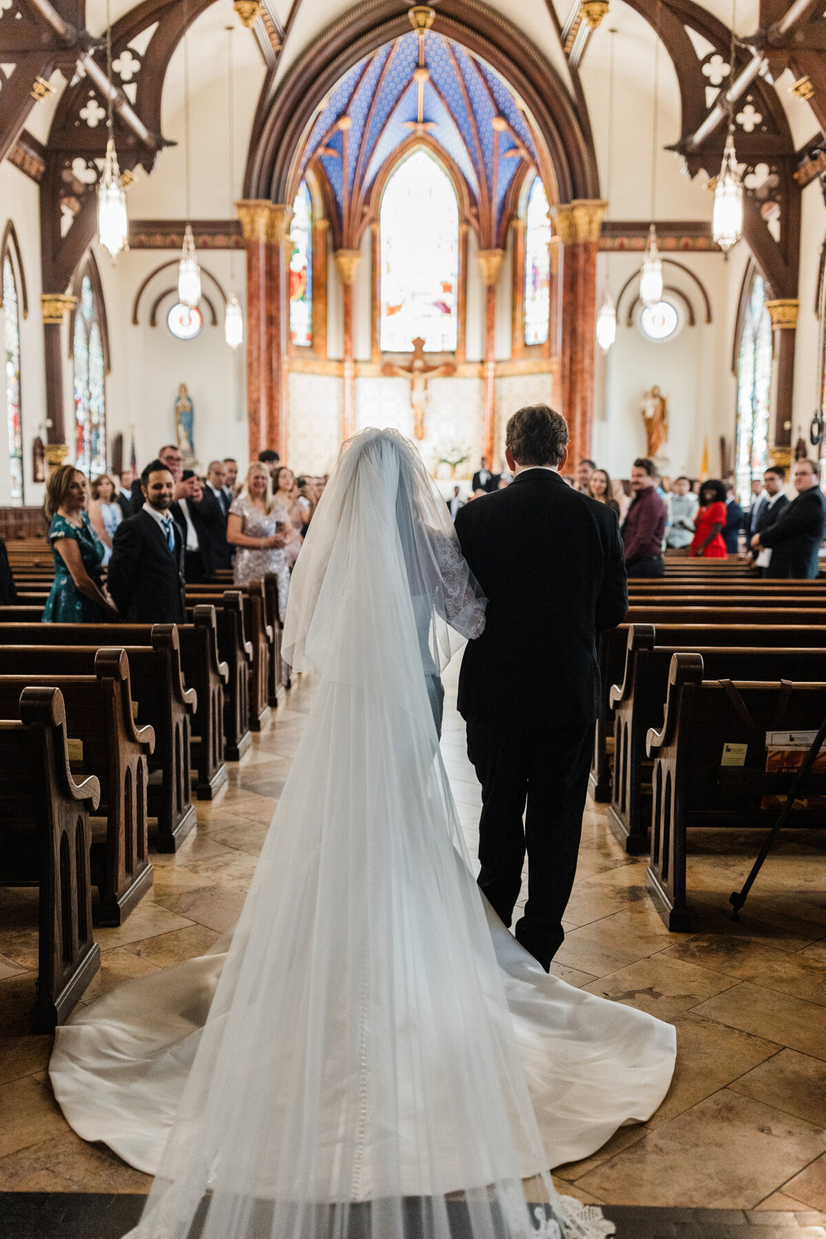 bride walks down ailse