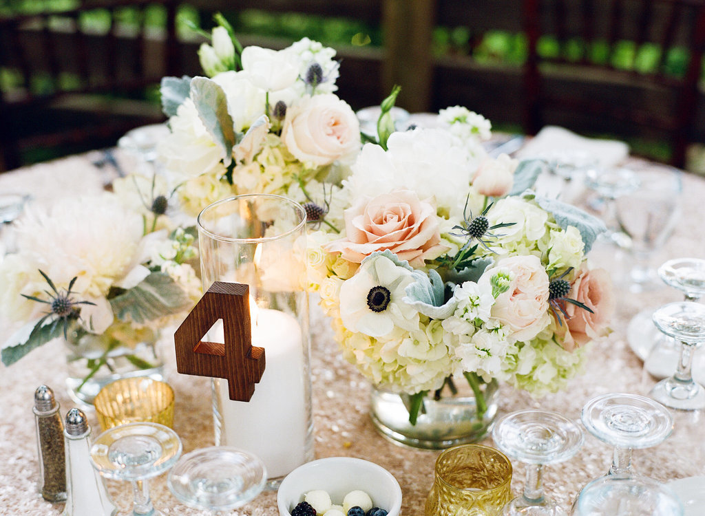 white, peach, gray and blue centerpieces