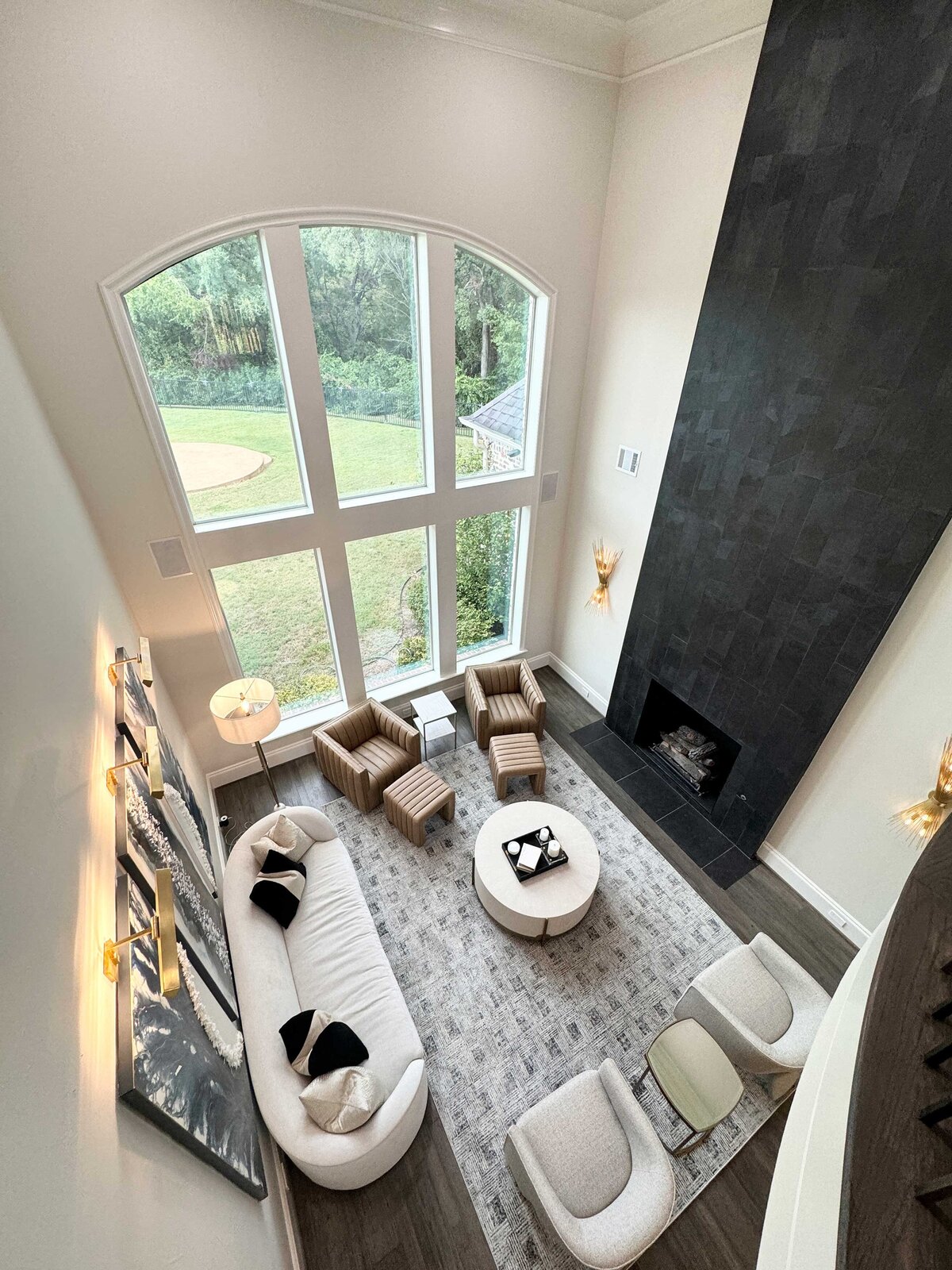 Full-service home design contractor services featuring a beautifully designed living room with custom furniture, lighting, and decor elements, reflecting a harmonious and functional space.