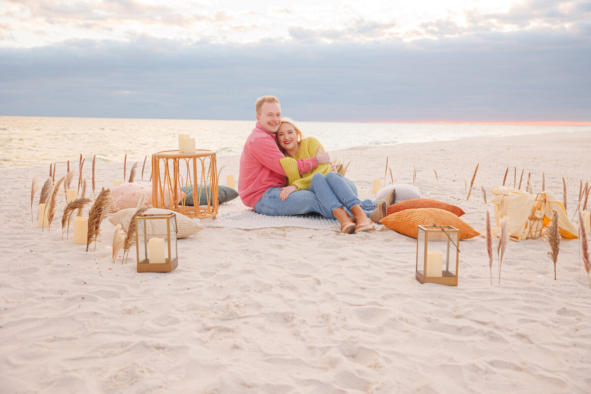 couple in an embrace after surprise proposal