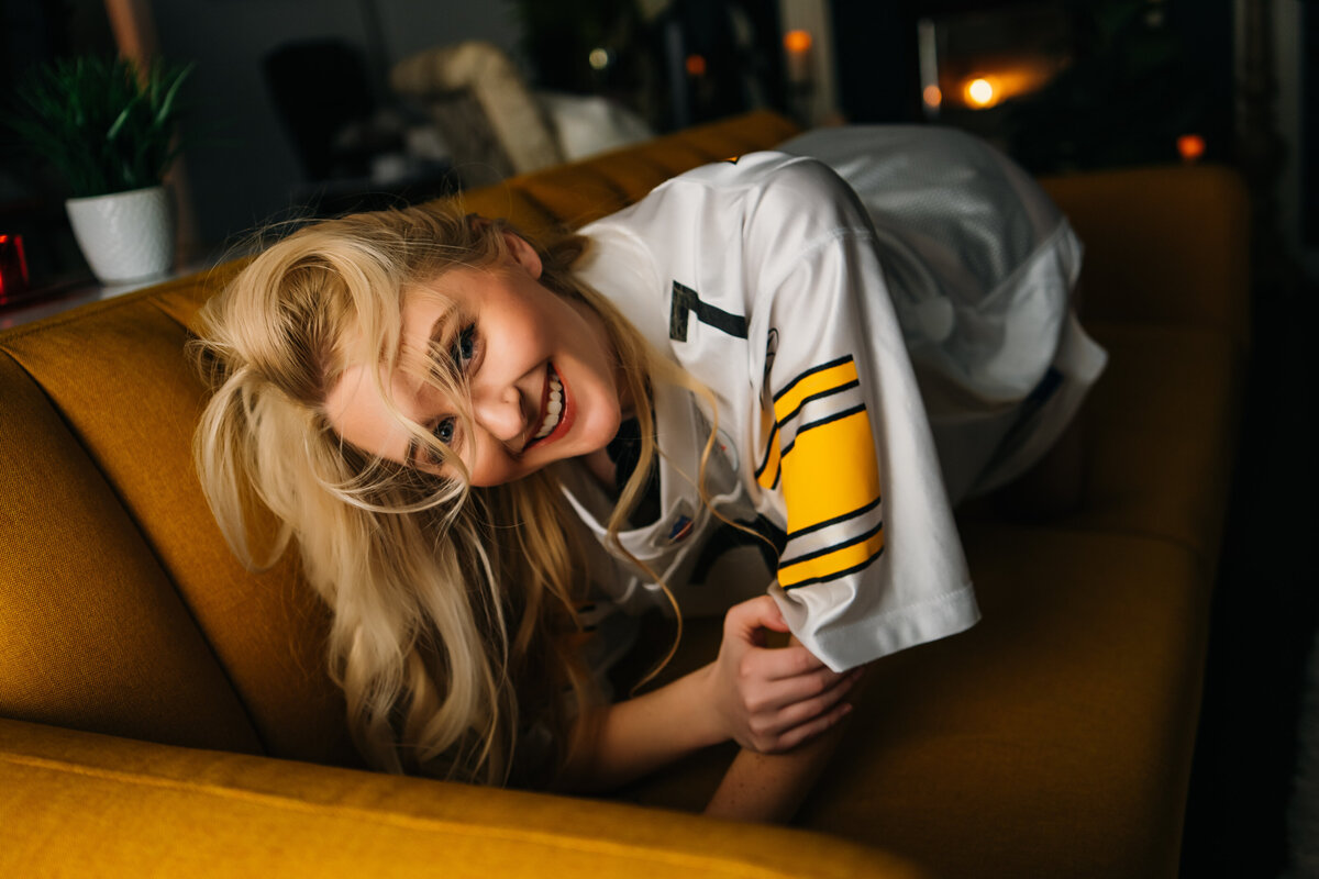 You can wear your mate's favorite jersey for your boudoir session ! Captured in our Nashville boudoir photography studio
