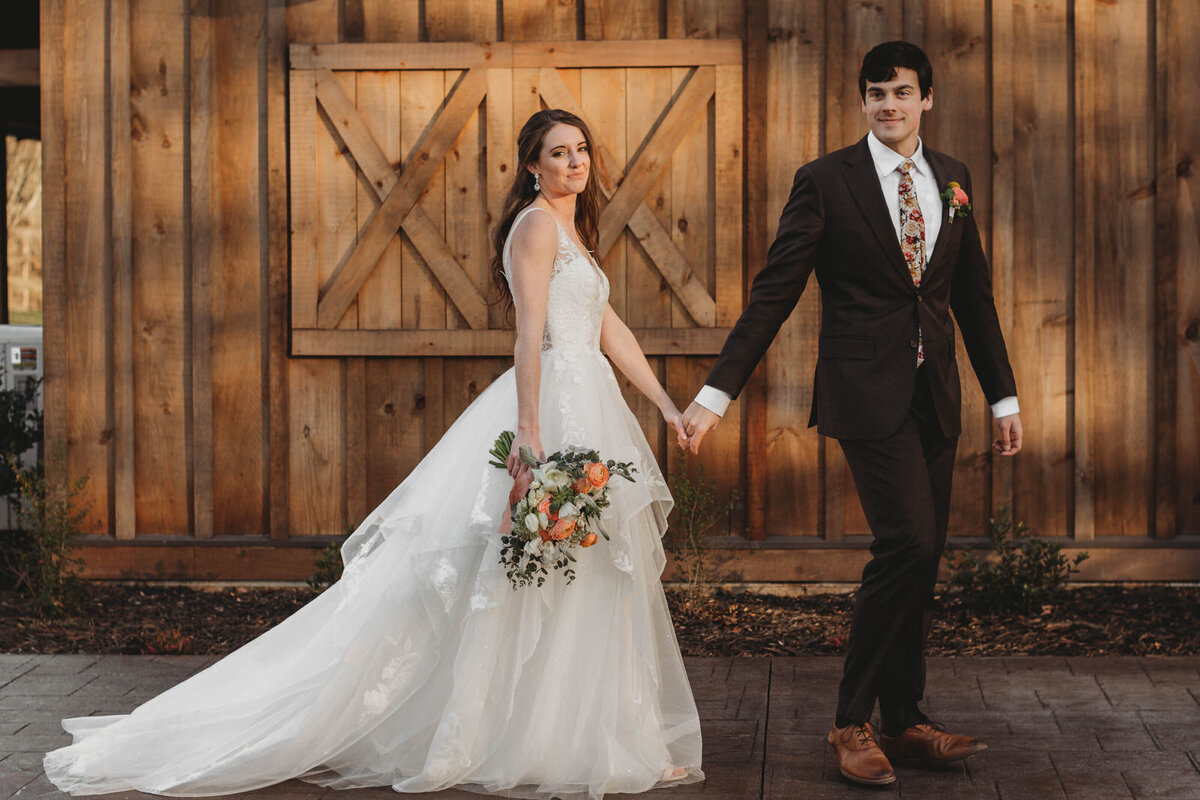 couple-at-barn-wedding