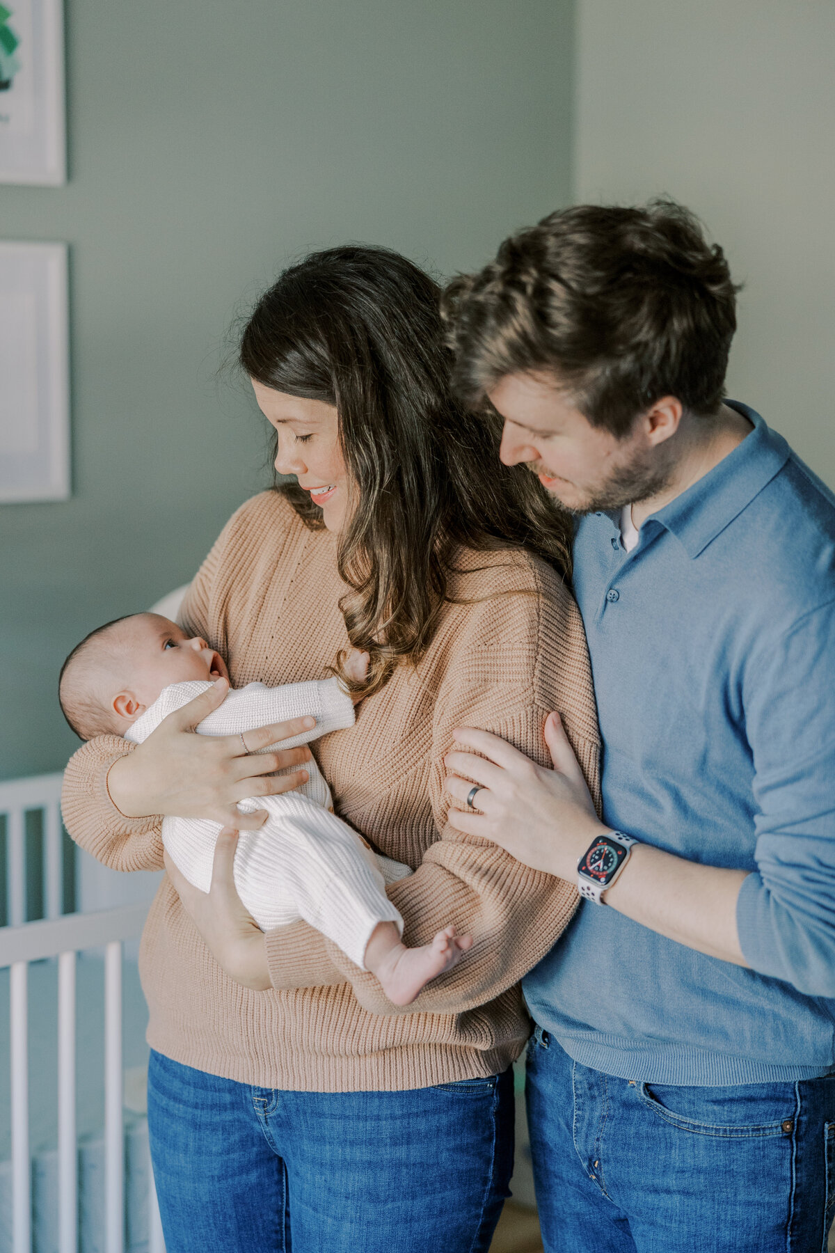 richmond-newborn-photo-session-parents-holding-baby.jpg​