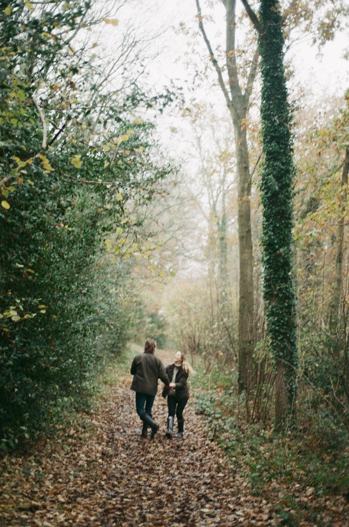 Engagement portraits in Castle Combe, Cotswolds captured on 35mm film