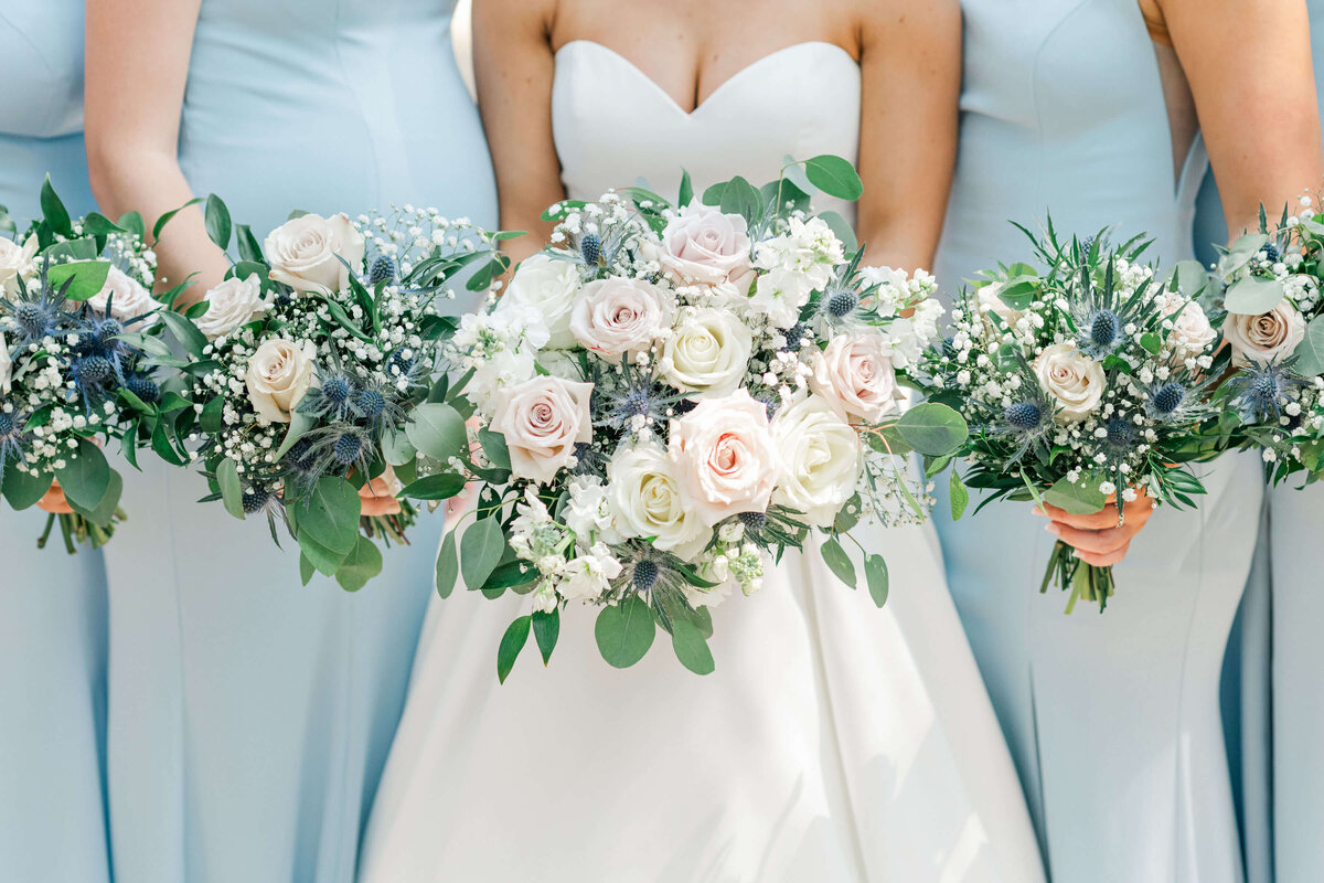 Bride and Bridesmaids holding wedding bouquets
