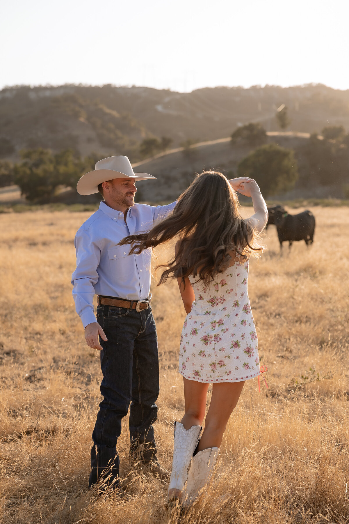candid dancing couples engagement photos in San Luis Obispo on the Central Coast