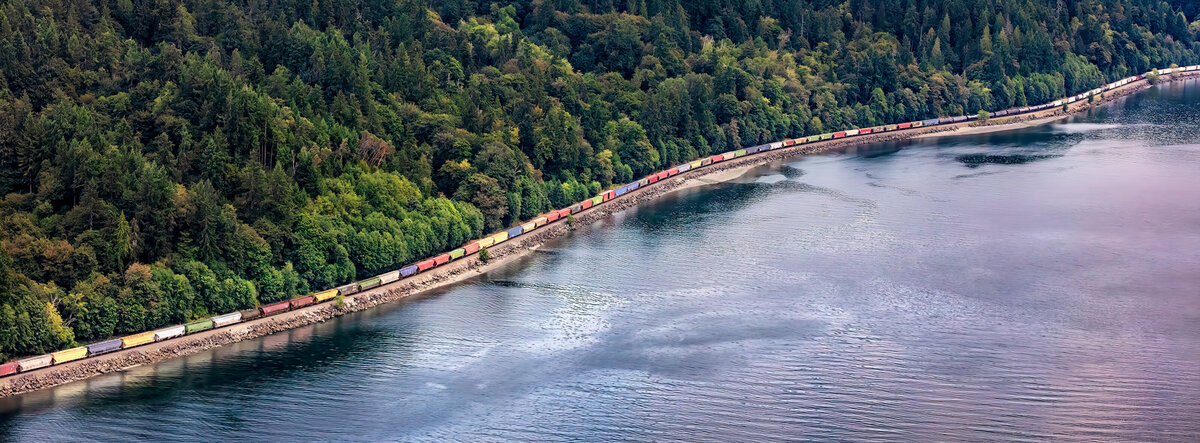 aerial image of train on coast