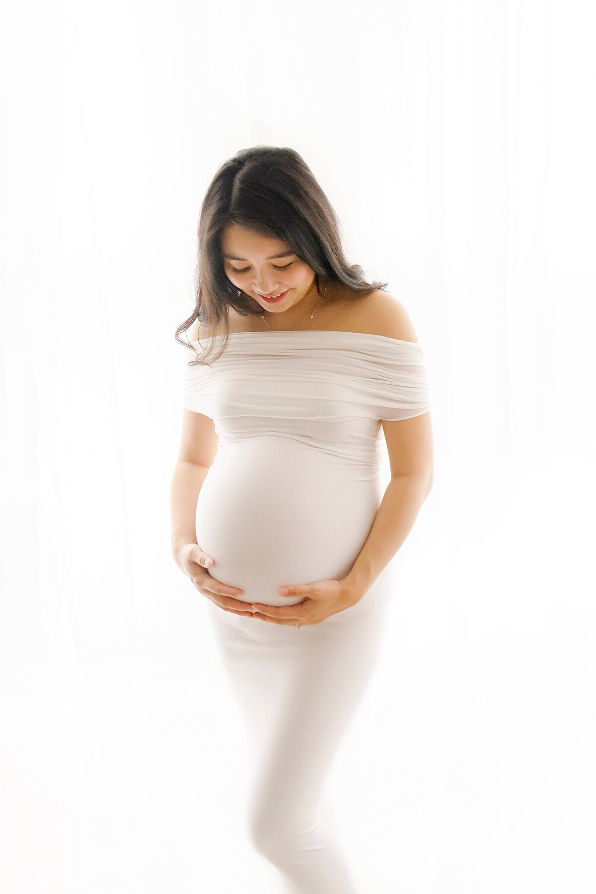 pregnant mom photo taken by maternity photographer boston ma​