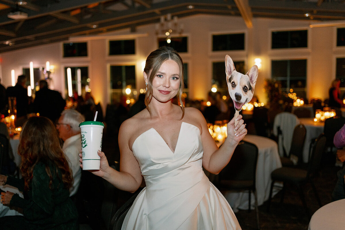 Wedding dance floor photos at Boatwerks in Holland Michigan with colorful lights and fun candid moments.