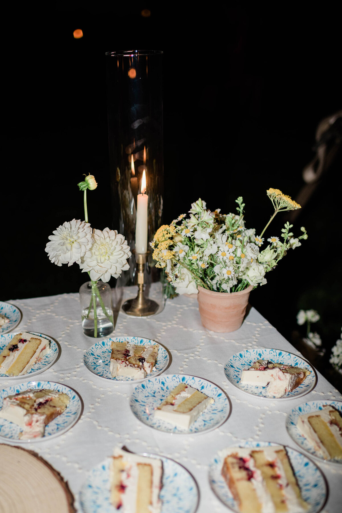 Cake slices sit on a reception table